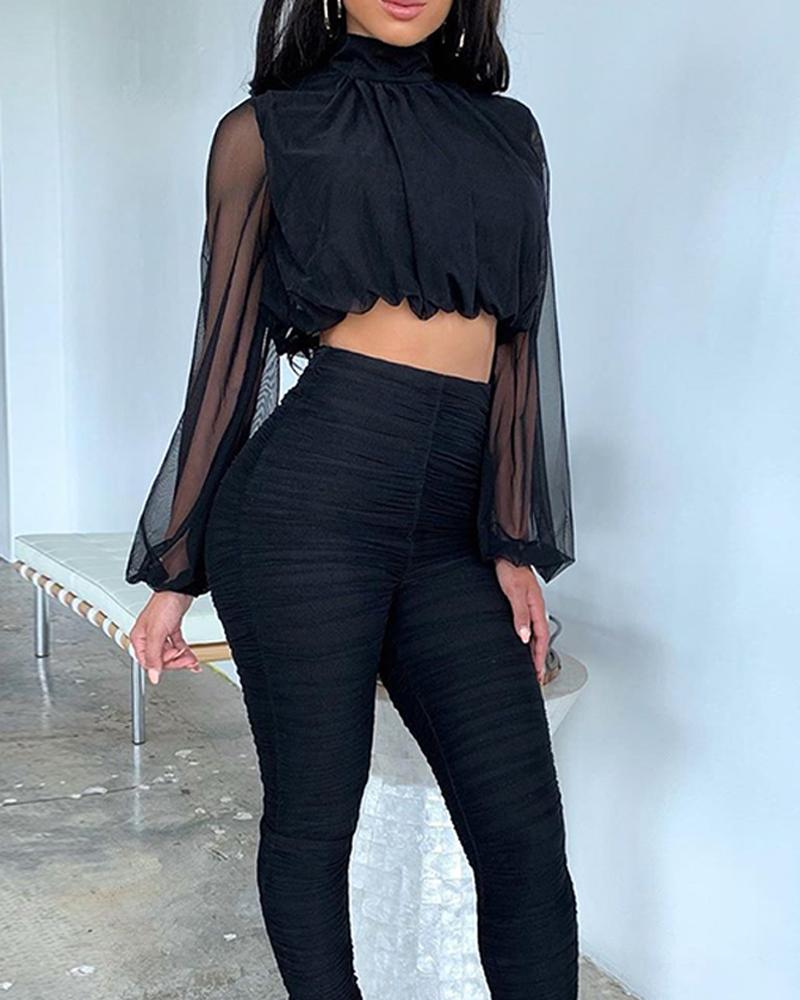 high waisted trousers and crop top